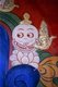 China: Demon painted on a doorway at Labrang Monastery, Xiahe, Gansu province